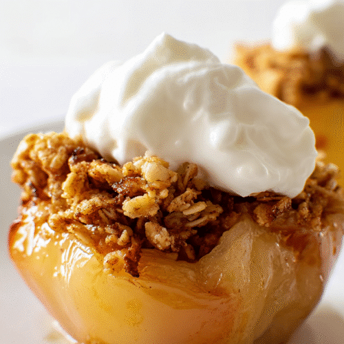 Air fryer baked apple with oat crumble and whipped cream